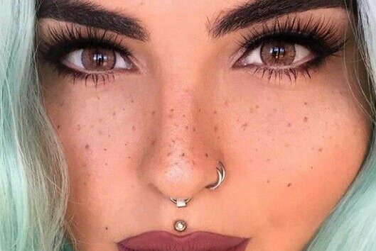 868958f7b59e956fc0b3a79d973accce-double-nose-piercing-face-piercings.jpg