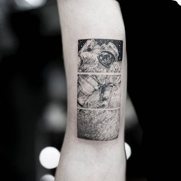 Detailed-black-and-gray-astronaut-tattoo