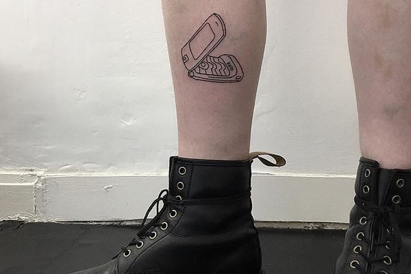 Feature-phone-tattoo-handpoked-by-zero-zero-tattoo.jpg