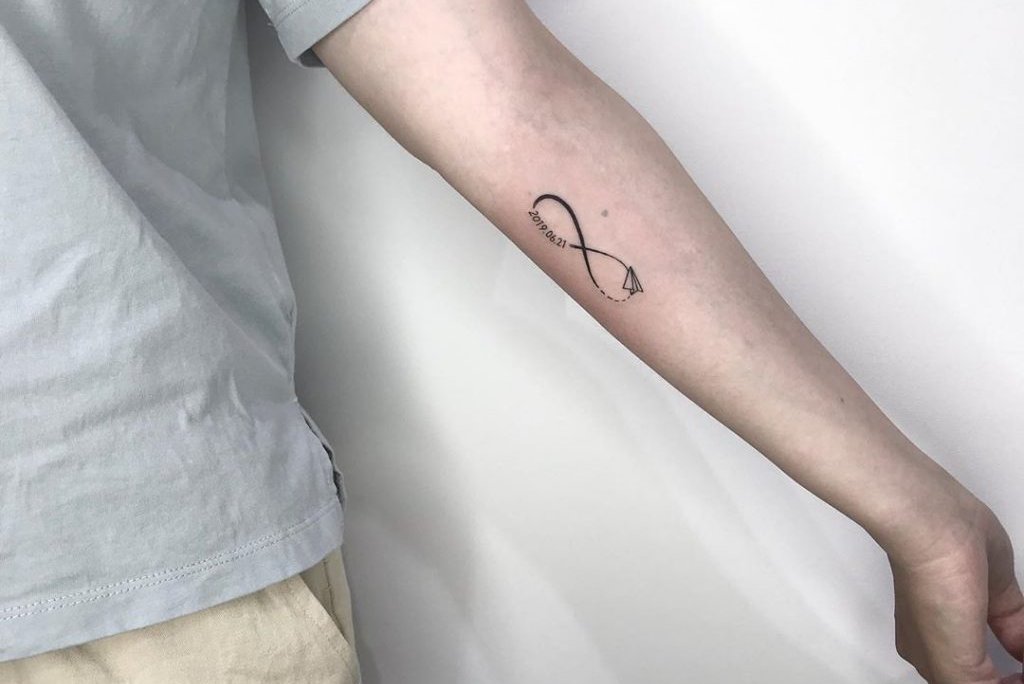 Infinity-symbol-with-a-date-an-a-paper-airplane-1024x1024