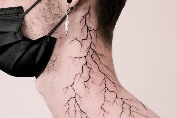 Lightning-mens-neck-tattoo