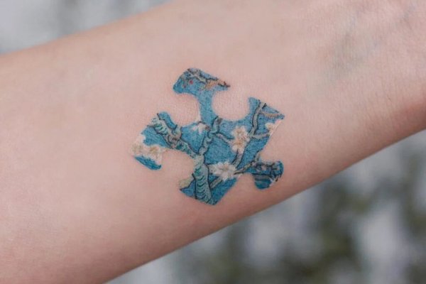 Puzzle-autism-tattoos-for-son-1024x1024