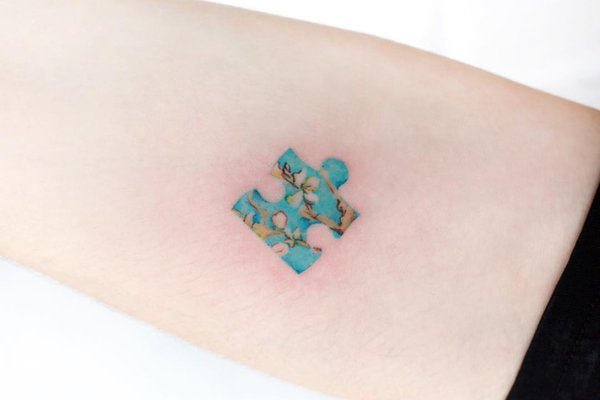 Puzzle-piece-by-tattooist-Ida