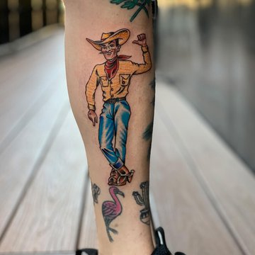cowboy-leg-tattoo.jpg