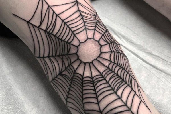 elbow-linework-spider-web-tattoo-water