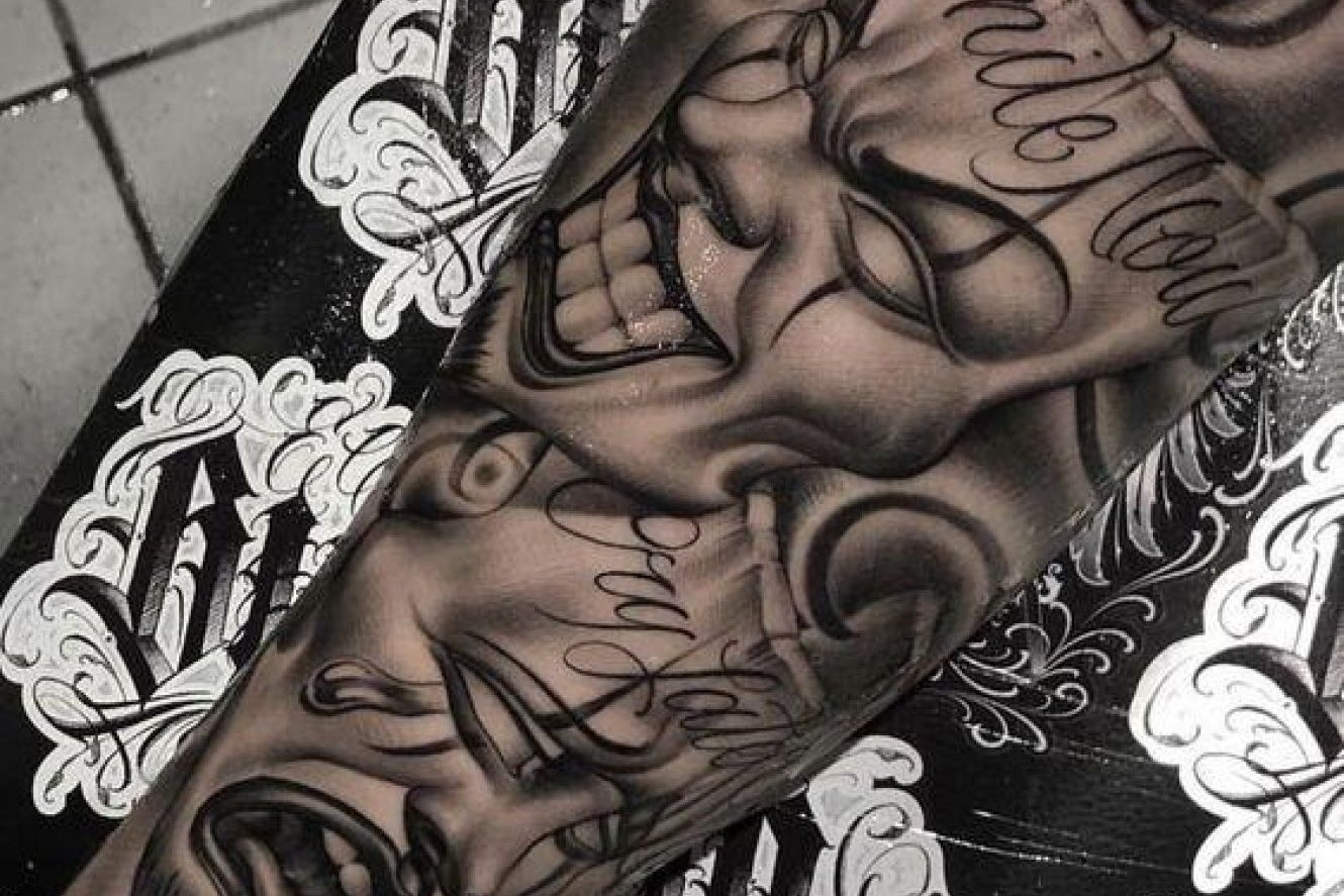 forearm-chicano-mask-tattoo-water