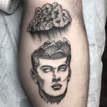 surrealism_style_black_ink_leg_tattoo_of6.jpg